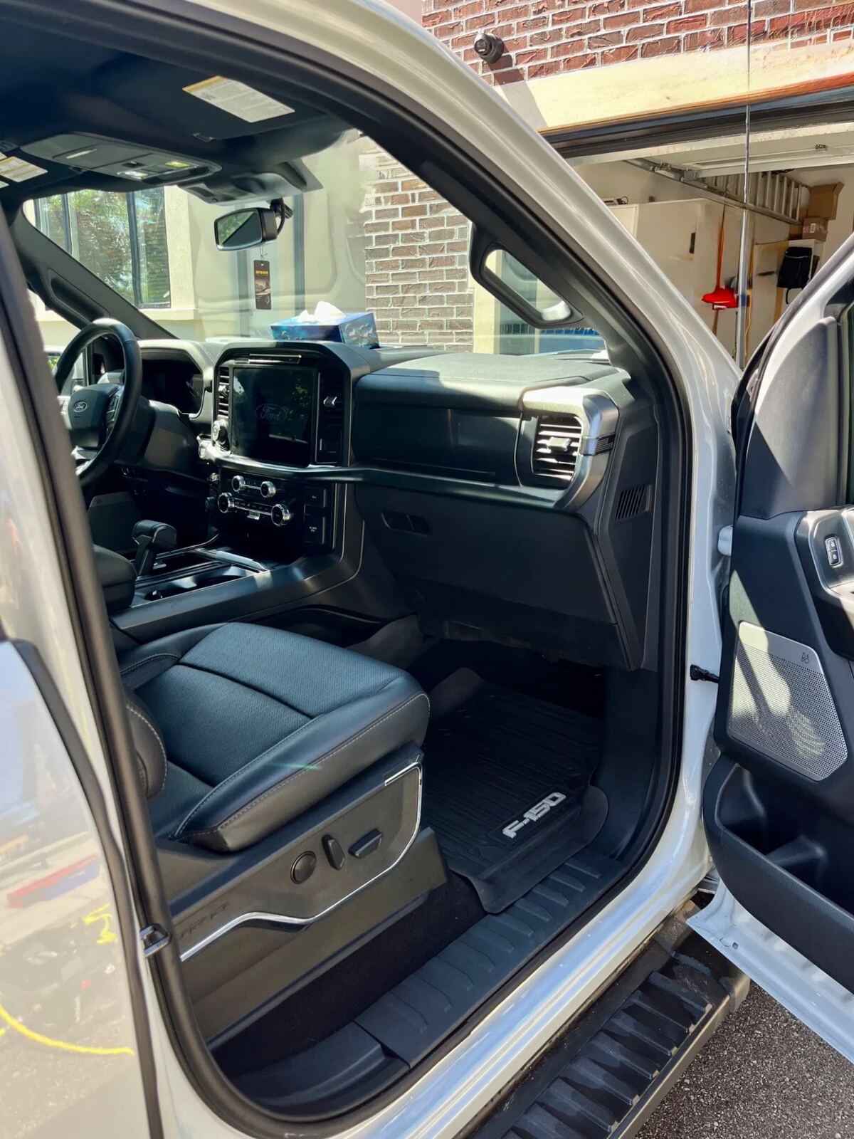 Ford F-150 passenger cabin fully detailed with spotless mats and conditioned trim